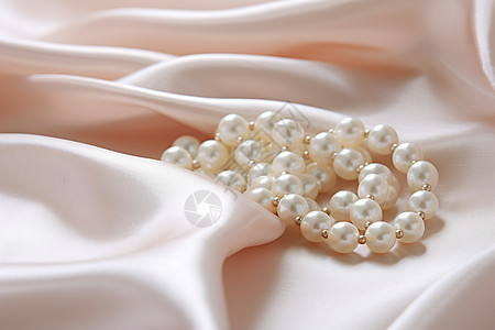 珍珠与丝绸的组合背景图片