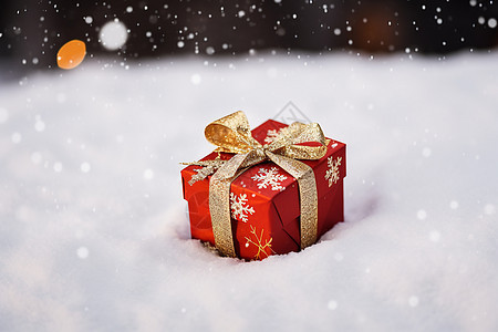 雪地中的圣诞节礼盒背景图片
