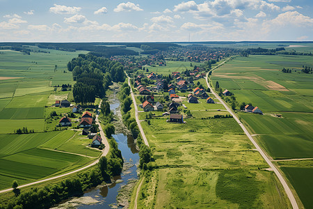天空下的乡村与河流图片