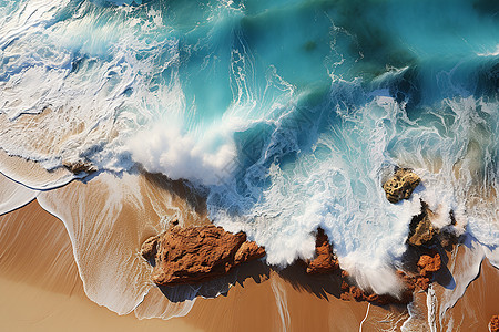 拍打礁石的海浪浪花图片