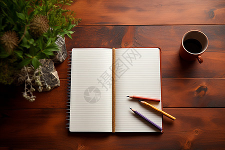书桌上的笔记本和咖啡图片