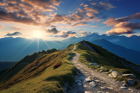 太阳下山夕阳下山脉的小径背景