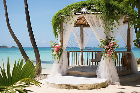 沙滩上的婚礼凉亭背景图片