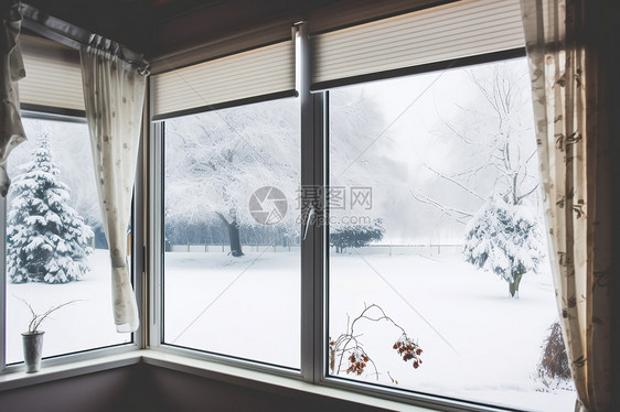 窗边白雪纷飞图片