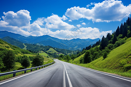 蓝天与公路马路山脉间的一条公路背景