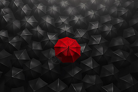 黑色背景下的红伞图片