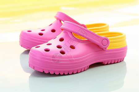 洞洞鞋粉色与黄色相接的凉鞋背景