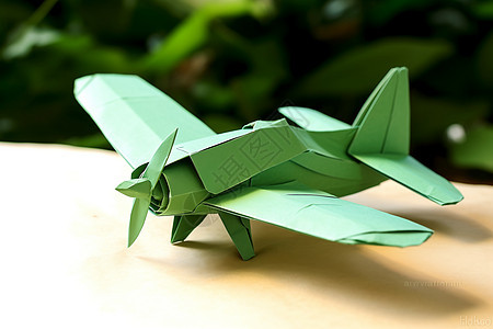绿色的手工折纸飞机背景图片