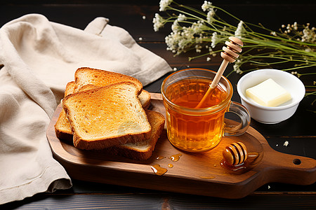 桌子上的面包和蜂蜜图片