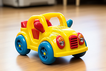 木地板上有一辆玩具车高清图片