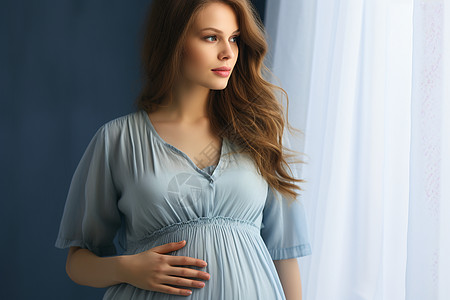 期待新生的孕妇背景图片