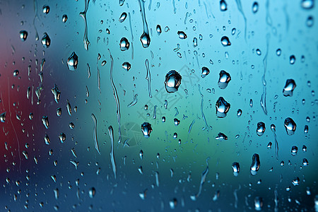 雨后窗户滚落的雨滴图片