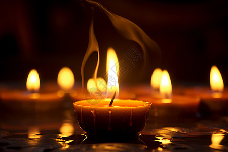 黑暗中的蜡烛背景图片