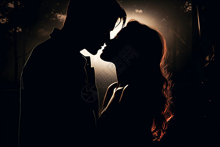 路灯下接吻的情侣图片