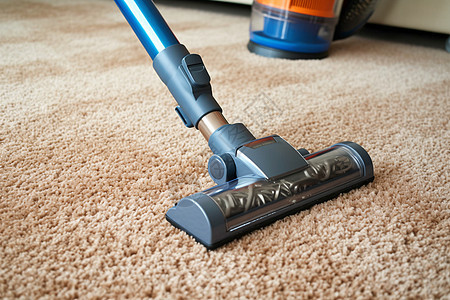 清理地毯的吸尘器背景图片