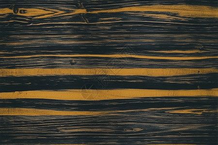 木桌上的黄色纹路背景图片