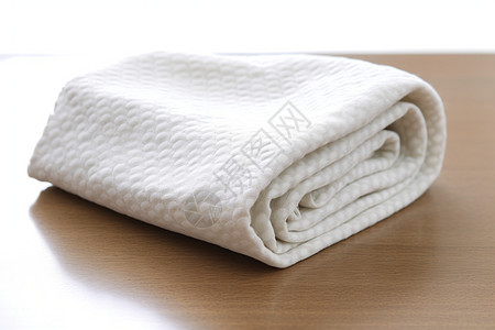 桌面上折叠的毛巾背景图片