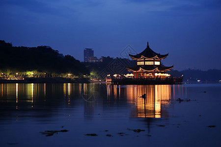 夜幕下的西湖背景图片