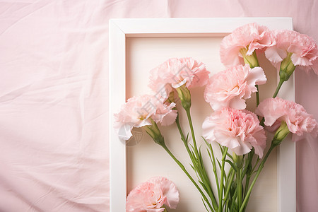相框中的康乃馨花束图片