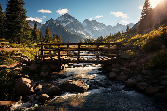 户外山脉中的木桥和小溪图片