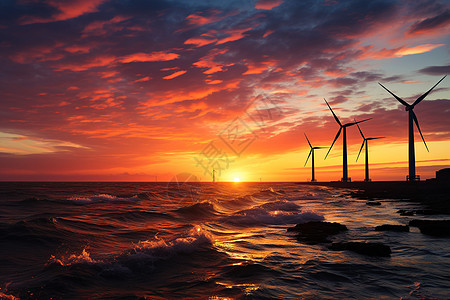 日落时的风力发电机群图片