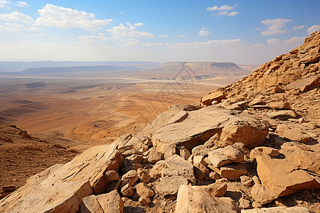 沙漠中的岩石背景图片