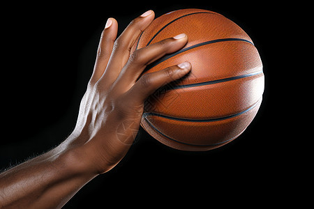 一只手拿着的篮球图片