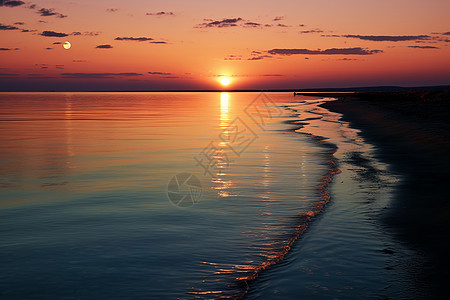 黄昏夕阳下的海滩背景图片