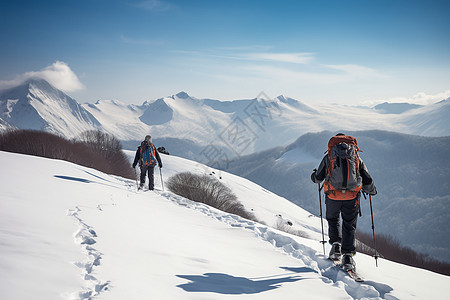 两个人在雪山上徒步攀登背景图片