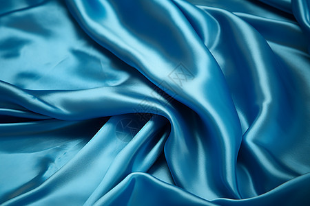 柔软光滑的蓝色丝绸织物图片