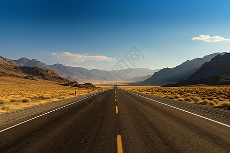 山脉下的一条长长公路图片