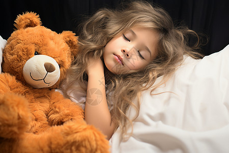 抱着玩偶睡觉的小女孩图片