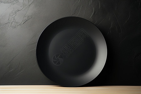 桌子的黑色盘子背景图片