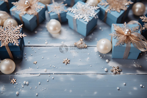 蓝色礼物盒上的雪花图片