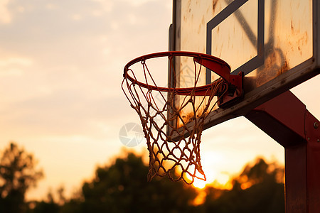 日落下的篮球架背景图片