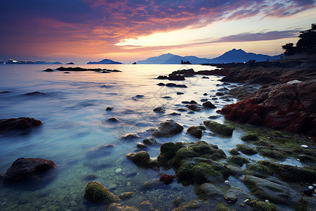 海边的夕阳余晖背景图片