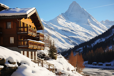 雪山旁的小屋图片