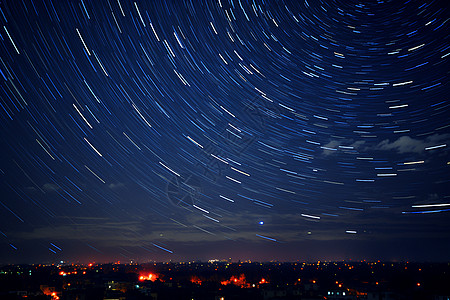 夜幕下的星空与城市图片