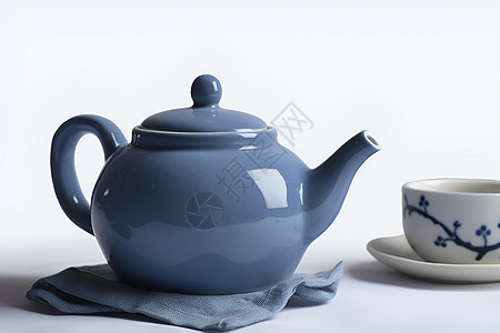 蓝色陶瓷茶壶背景图片