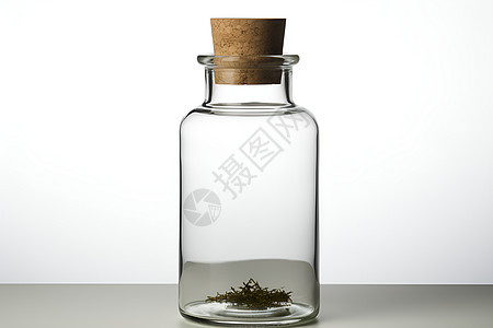 桌面上透明的玻璃瓶背景图片