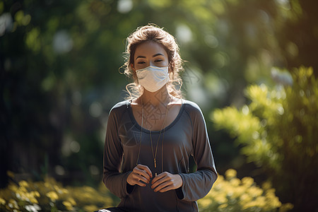 戴口罩防护病毒的运动女性图片