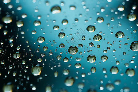 雨水玻璃窗雨水模糊的玻璃窗背景