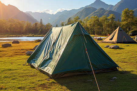 山水间露营的帐篷背景图片