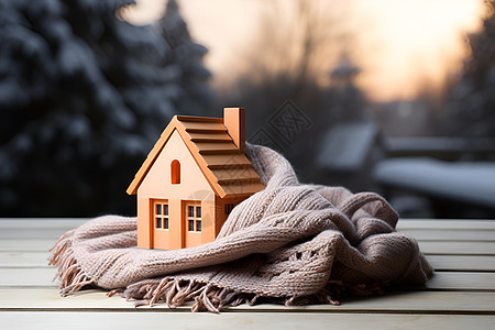 寒冬中小屋的温暖背景图片