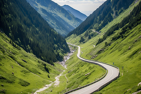 山谷中一条蜿蜒道路背景图片