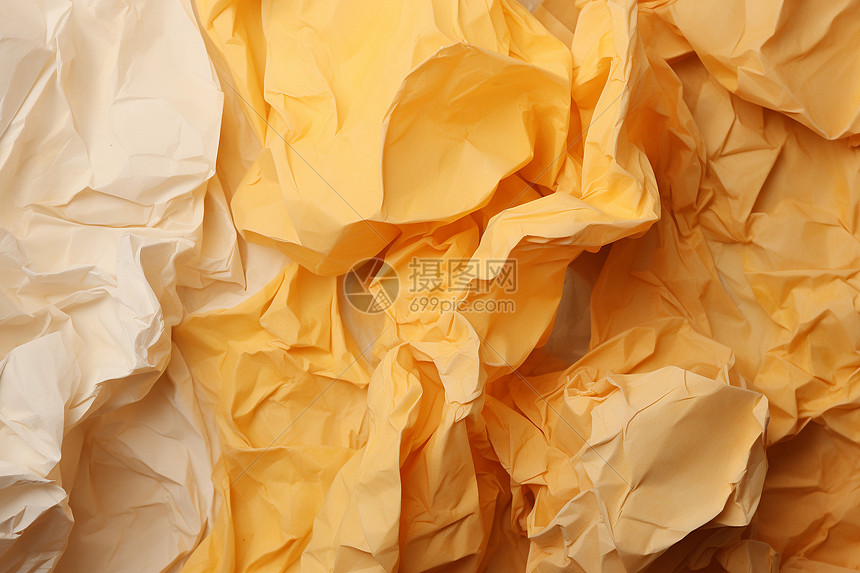 折叠的黄色纸团图片