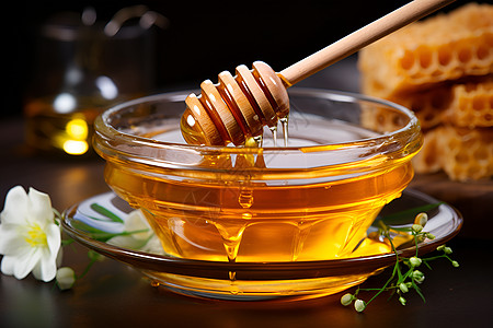 蜂蜜美食玻璃碗里的蜂蜜背景