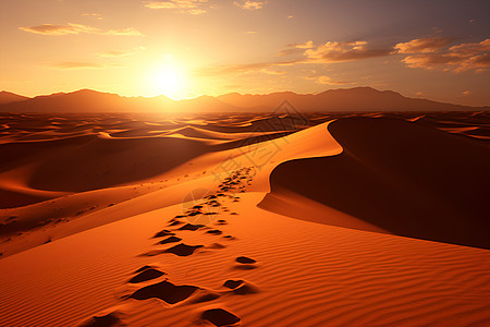 沙漠黄昏沙漠里的脚印背景