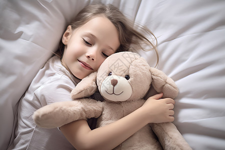 女孩和泰迪熊在床上睡觉背景图片