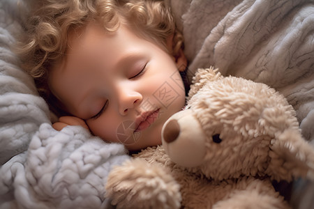 孩子抱着玩具熊睡觉图片